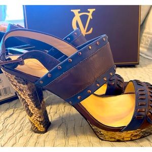 Elegant high heel platform sandals size 8M in excellent condition.